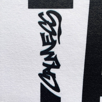 CALMECS T-SHIRT IN COLOR WHITE WITH BLACK I LOVE TAX FRAUD FONT AND RED HEART FRONT PRINT. CLOSE UP CALMECS FONT.